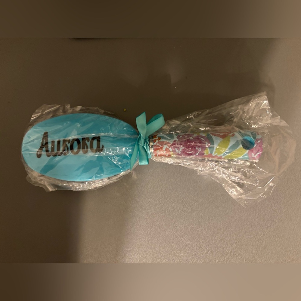 Hair brush personalized with the name Aurora. Brand new.